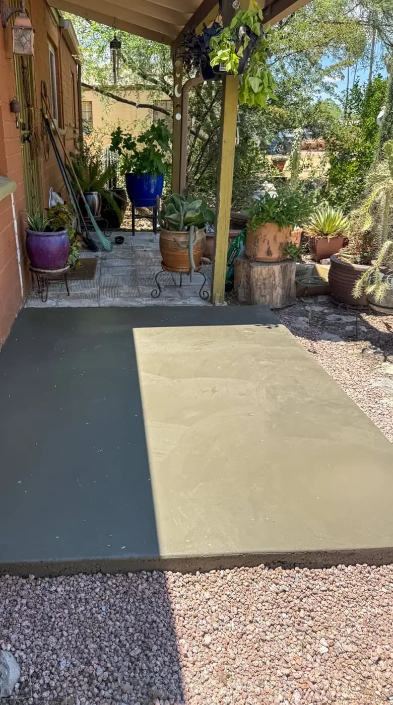 Colored concrete landing at a residential entrance
